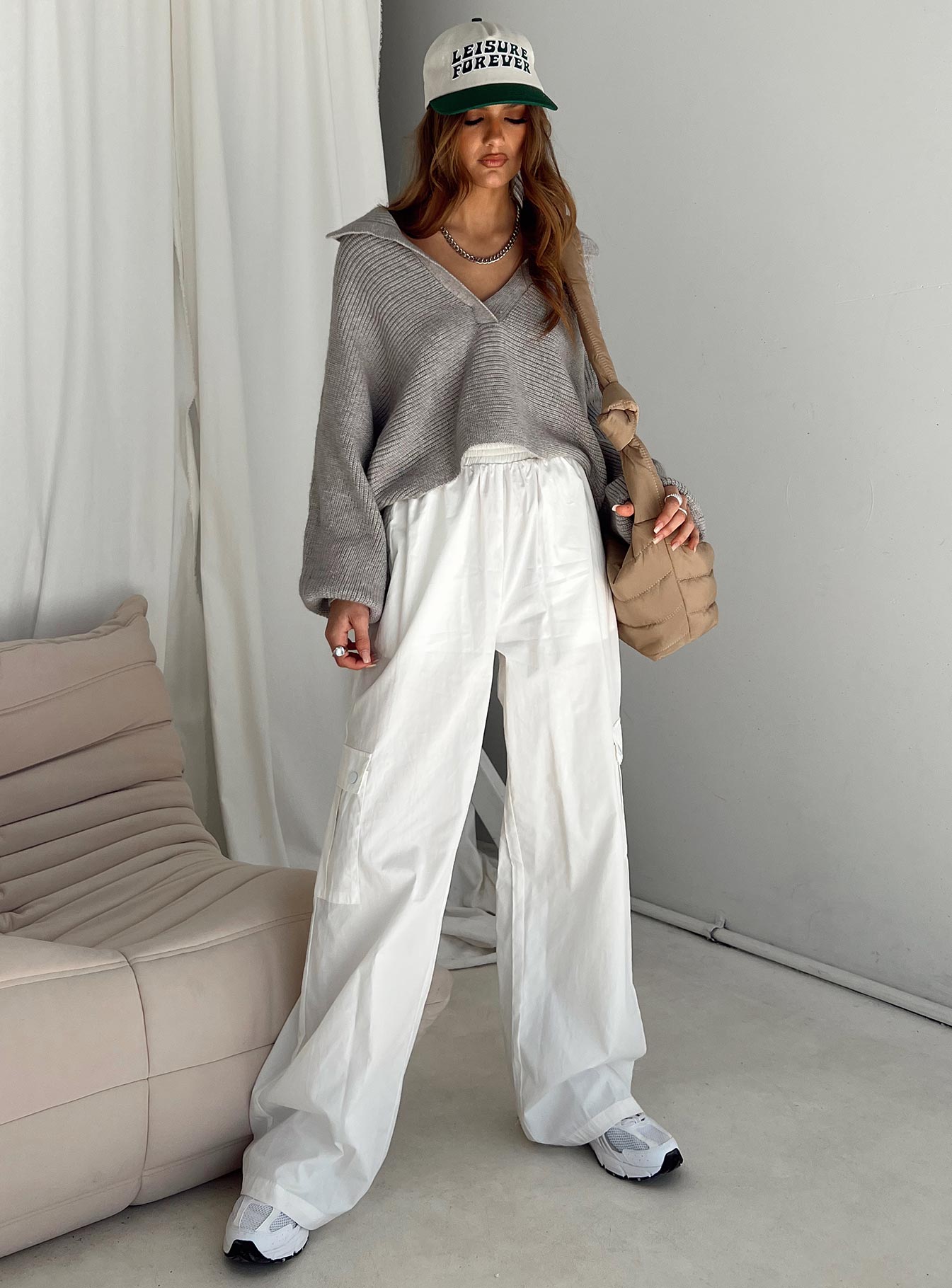 Sweater Relaxed fit 52% acrylic 28% nylon 20% polyester Knit material Wide collar Cropped design Good stretch Unlined