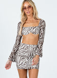 Matching set  Slim fitting  Princess Polly Exclusive 95% polyester 5% elastane  Length of size US 4 / AU 8 waist to hem: 43cm / 16.9"   Zebra print  Mesh material  Long sleeve crop top  Wired cups  High waisted mini skirt  Elasticated waistband 