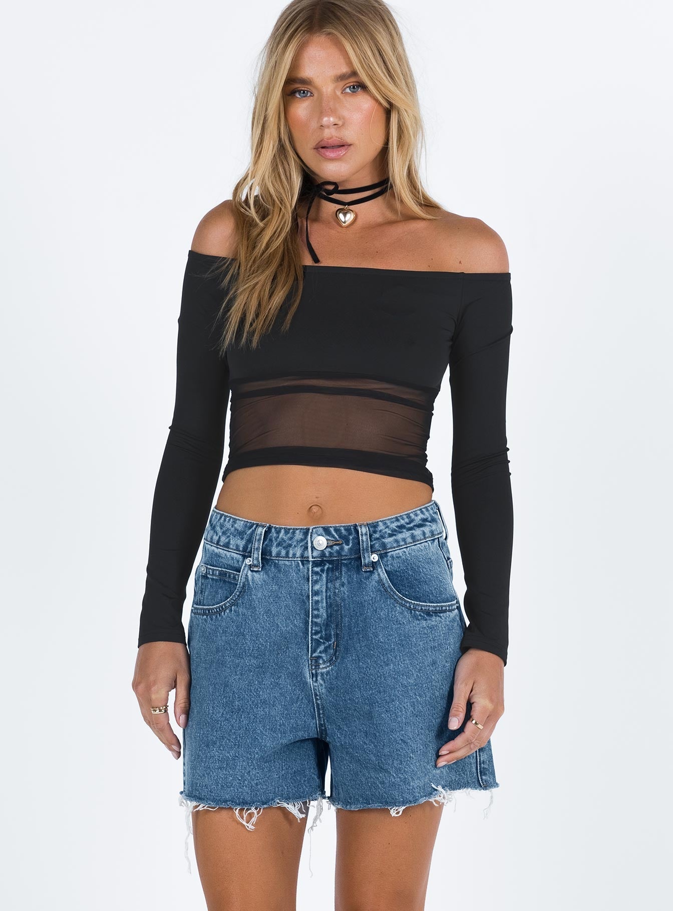 Denim shorts Zip and button fastening Belt loops at waist Raw cut hem Classic five pocket design Princess Polly patch on back