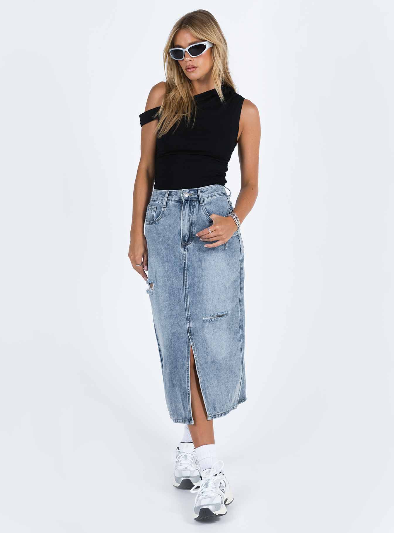 Midi skirt Light wash denim  Belt looped waist Zip and button fastening  Classic five pocket design Distressed detail Spilt hem