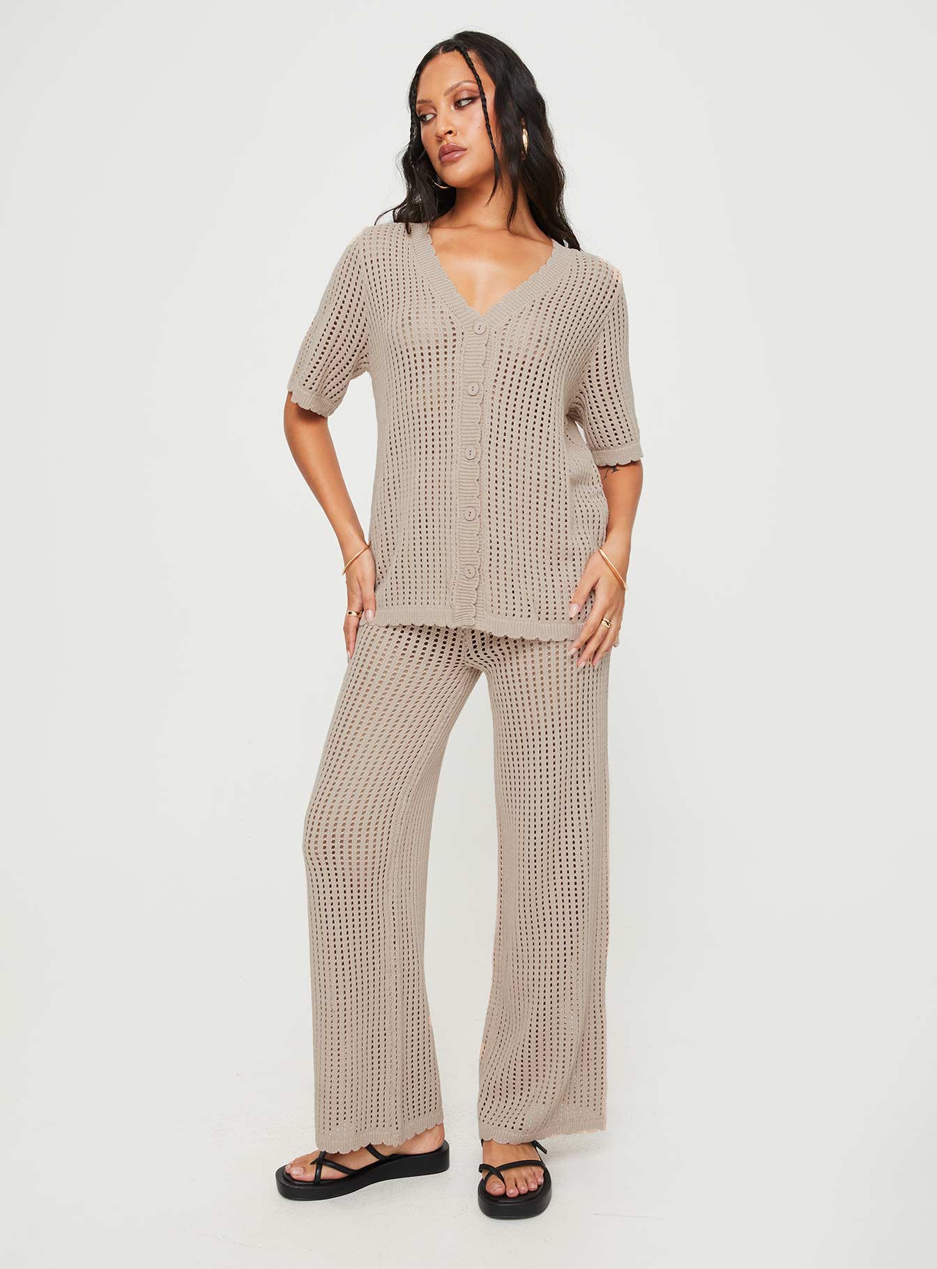 Crochet matching set  Button up shirt, v-neckline, button fastening at front, drop shoulder  High rise pants, thick elasticated waistband, straight leg