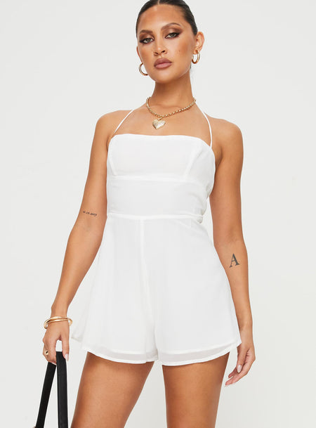 Romper Halter neck tie fastening, inner silicone strip at bust, invisible zip fastening at side Non-stretch material, fully lined