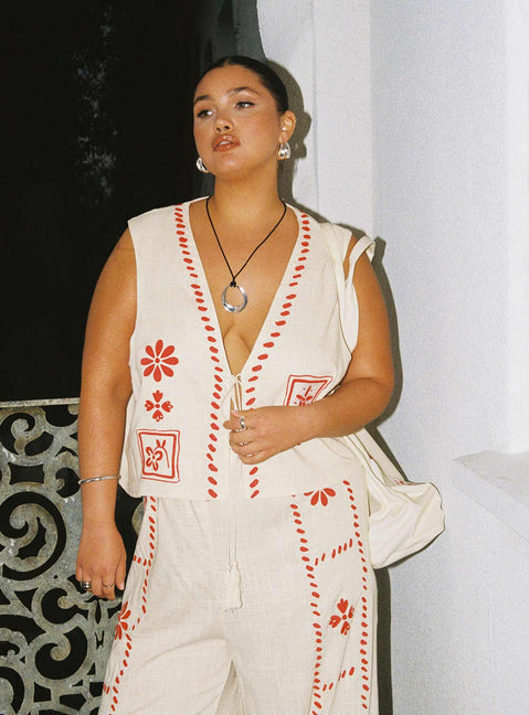 V neckline vest top Embroidered detail, tie closure with tassels