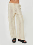 Low rise knit pants Drawstring waist with tie fastening, cargo style leg pockets, straight leg Slight stretch, unlined 