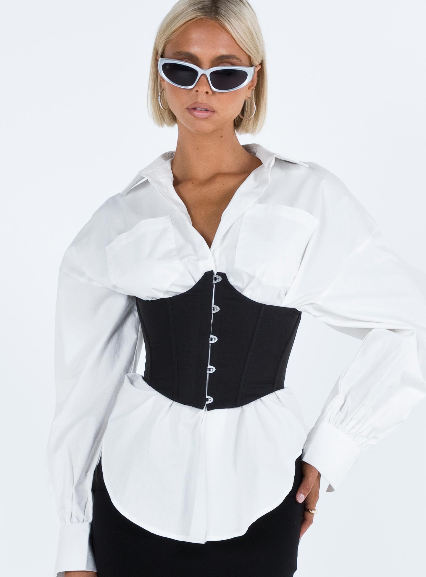 Corset Wired cups Cut out bust Metal fastening closure Boning through bodice Non stretch Fully lined 