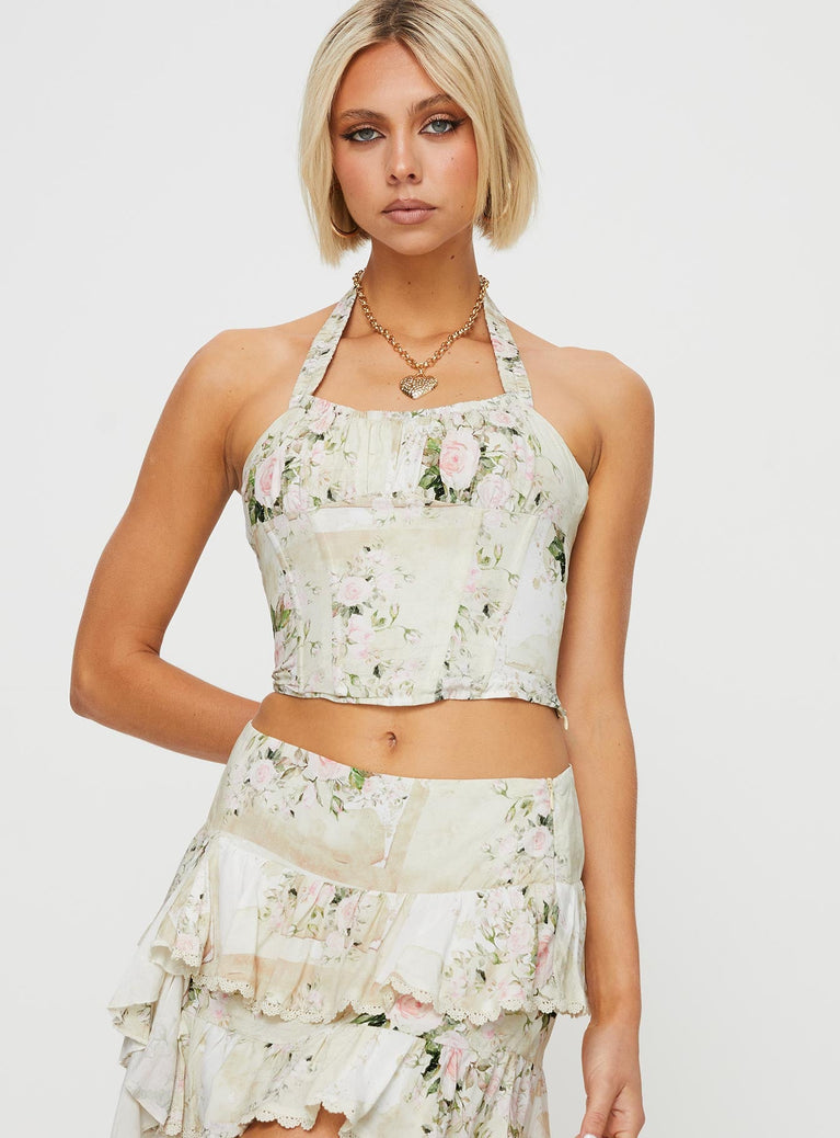 Floral halter neck corset Elasticated halter strap, lace up back with tie fastening, ruched bust, invisible zip fastening at side, boning throughout