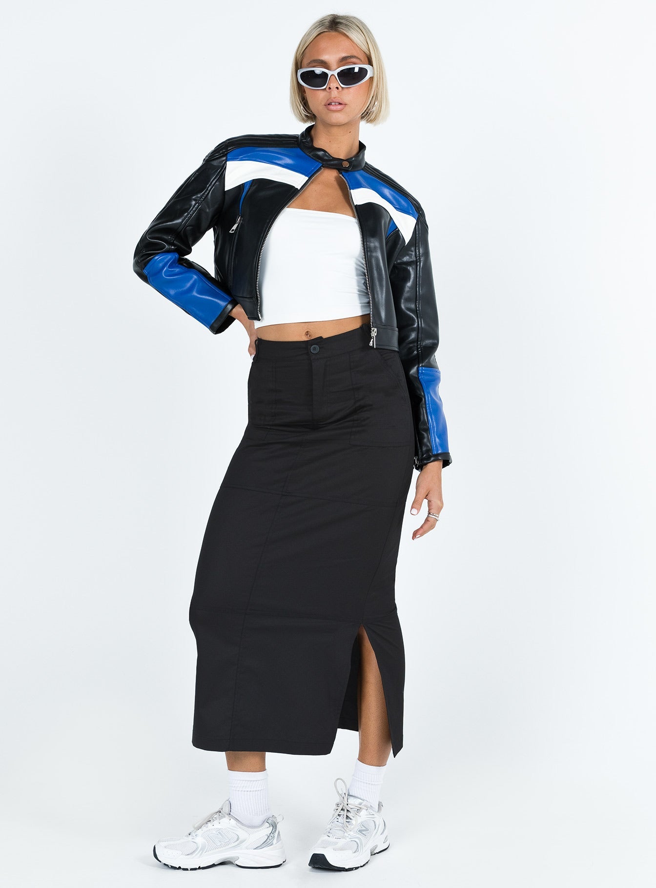 Black maxi skirt Low waist Belt looped waist Zip and button fastening Twin hip pockets Slit at side