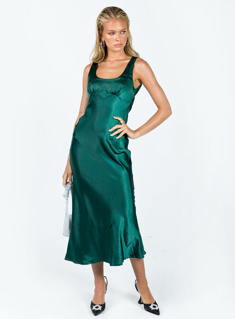Maxi dress Silky material Scoop neckline Subtle ruching at bust Open back with tie fastening Cowl back