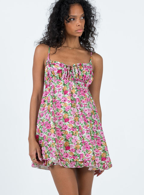 Mini dress Floral print Adjustable shoulder straps Tie fastening at front Plunging neckline Elasticated under bust Button fastening at back