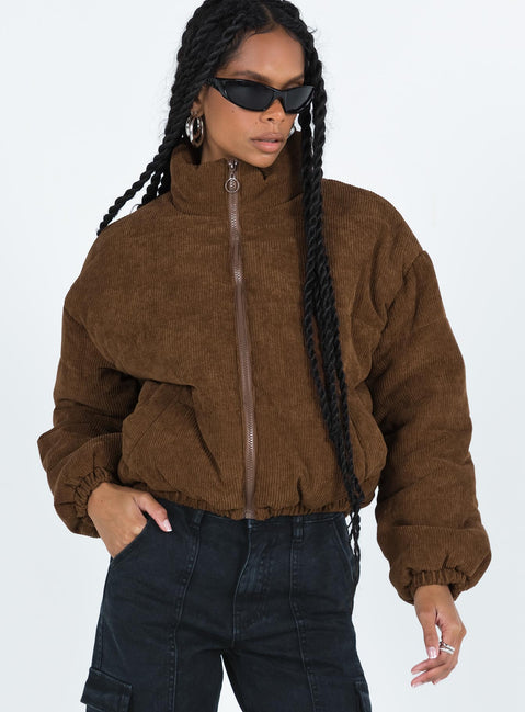 Relaxed fit brown puffer jacket Corduroy High neck Zip front fastening Twin zip front pockets Ribbed cuffs Elasticated waist