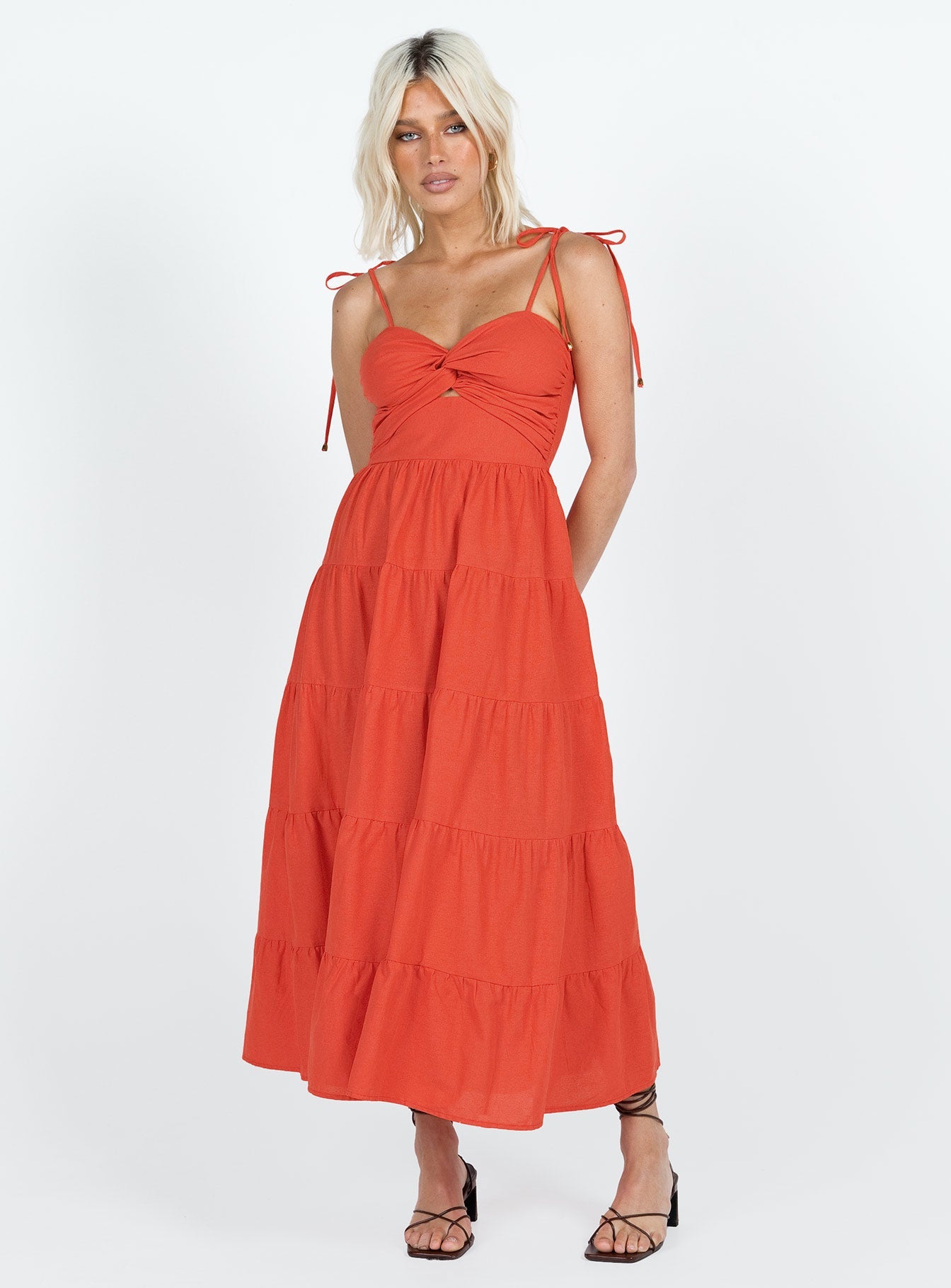 Midi dress Tie fastening shoulder straps Knot detail at bust Shirred band at back Cut out at waist Invisible zip fastening at back Tiered skirt