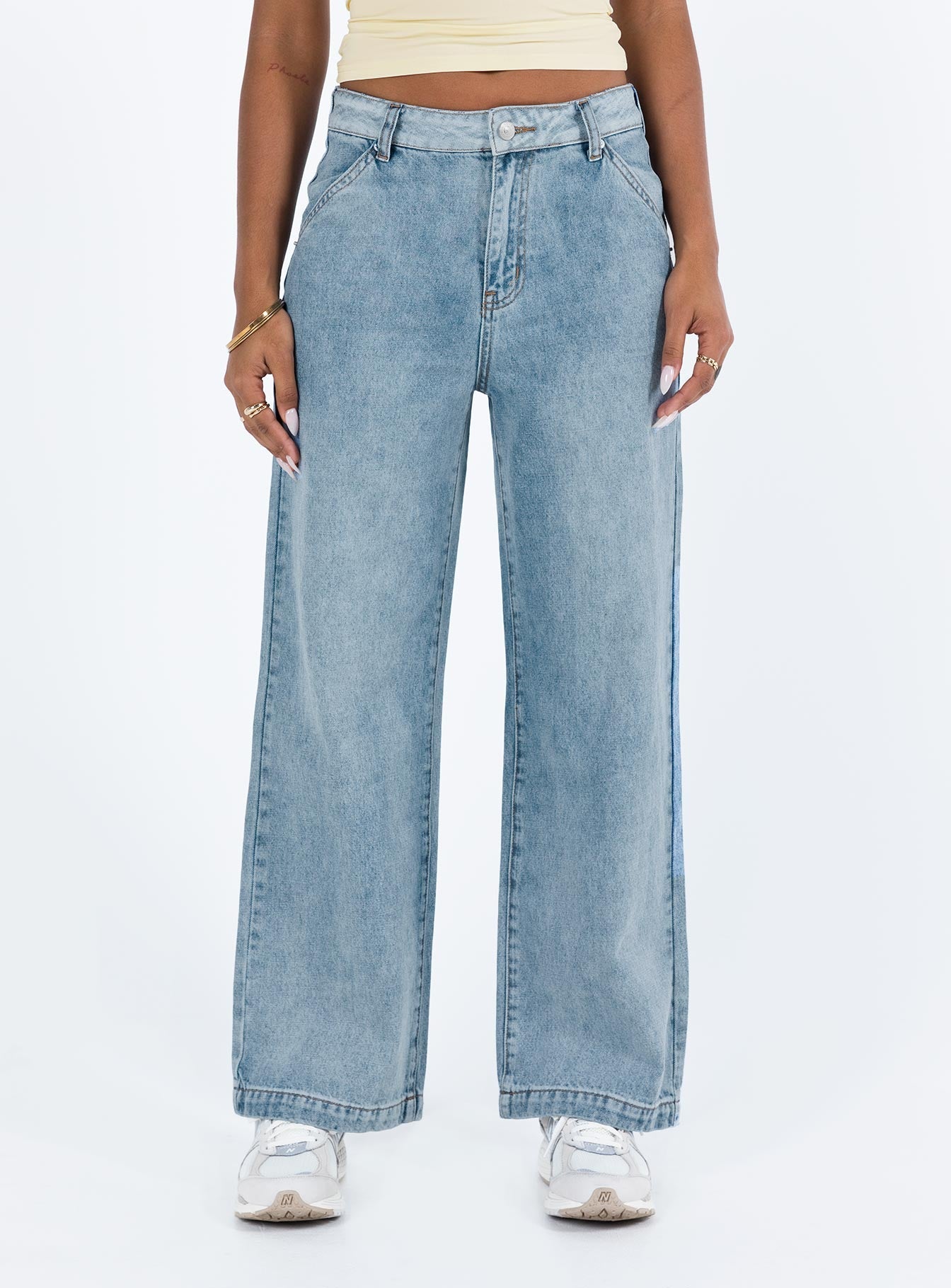 Jeans Mid wash denim High rise Belt looped waist Zip and button fastening Four classic pockets Branded patch at back Straight leg