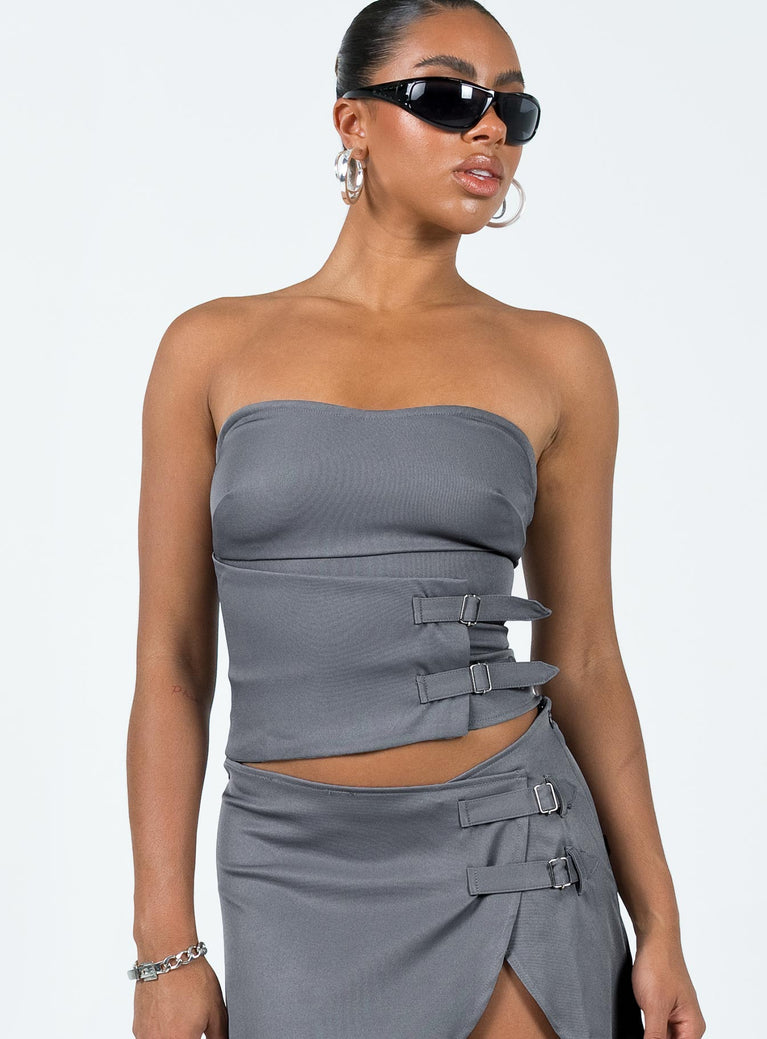 Strapless top Subtle sweetheart neckline Cropped fit Buckle detail Inner silicone strip at bust Boning at back Zip fastening at back