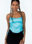 Strapless top Silky material Boning through front Adjustable tie ruching at sides Zip fastening at back