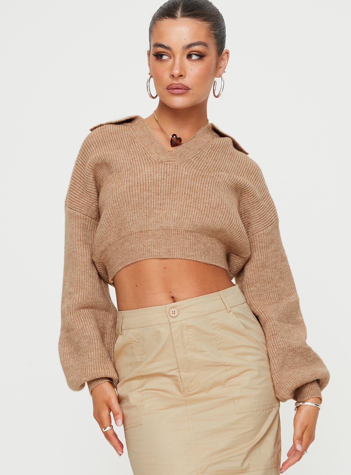 Collared sweater, knit material Crop style, v-neckline, balloon sleeves, ribbed cuffs and waist 