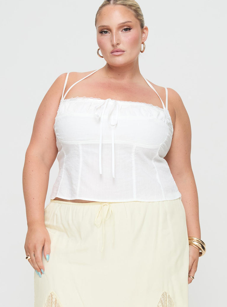 Princess Polly Curve  Crop top Adjustable shoulder straps, halter neck tie fastening, lace trim, ribbon detail at bust, invisible zip fastening at side Non-stretch, lined bust