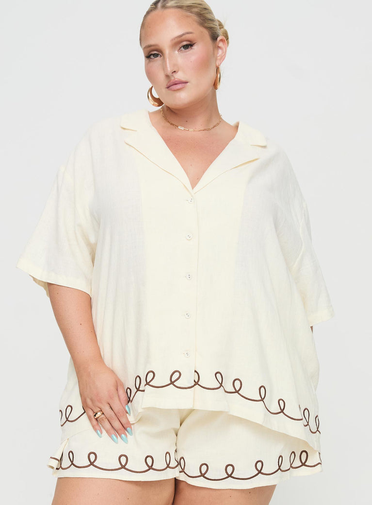 Princess Polly Curve  Linen shirt Lapel collar, button fastening down front, drop shoulder, embroidered graphic Non-stretch material, unlined  Princess Polly Lower Impact