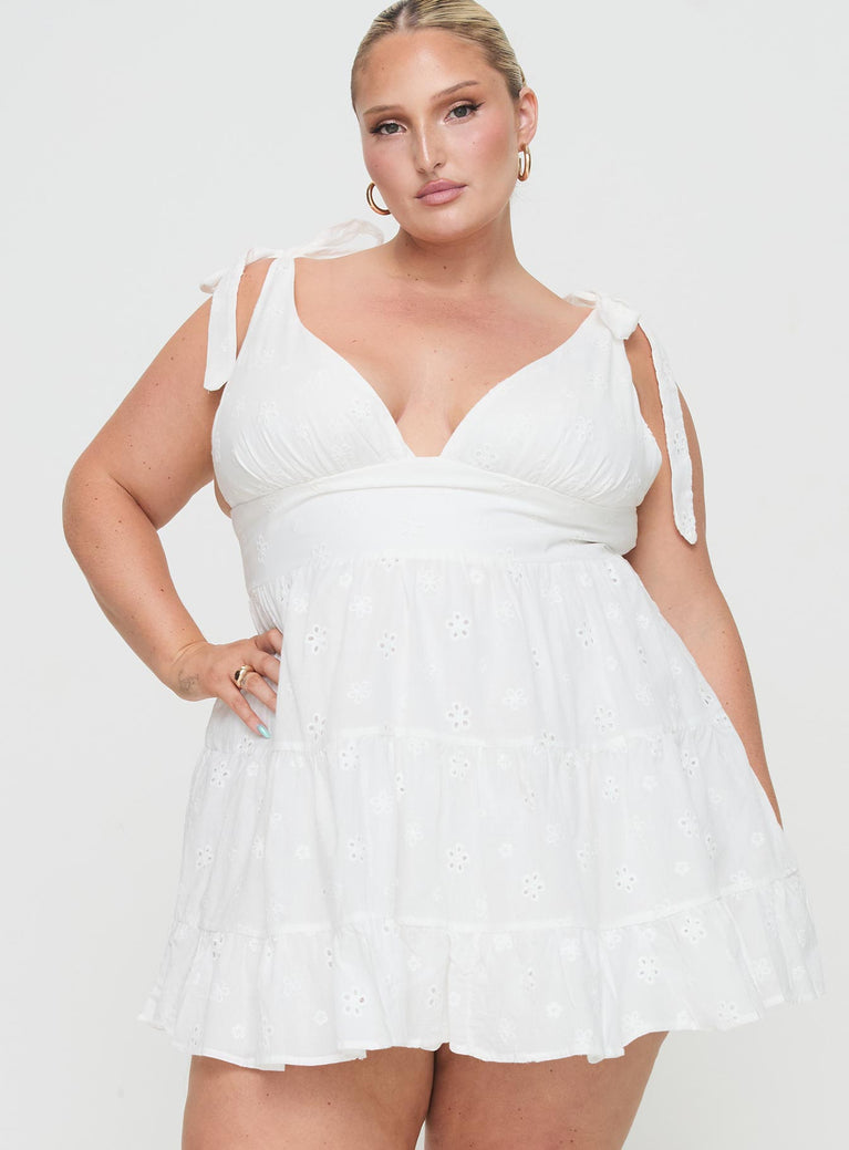 Princess Polly Curve  Mini dress Plunging neckline, adjustable shoulder straps with tie fastening, invisible zip fastening at back, tired skirt  Non-stretch material, unlined 