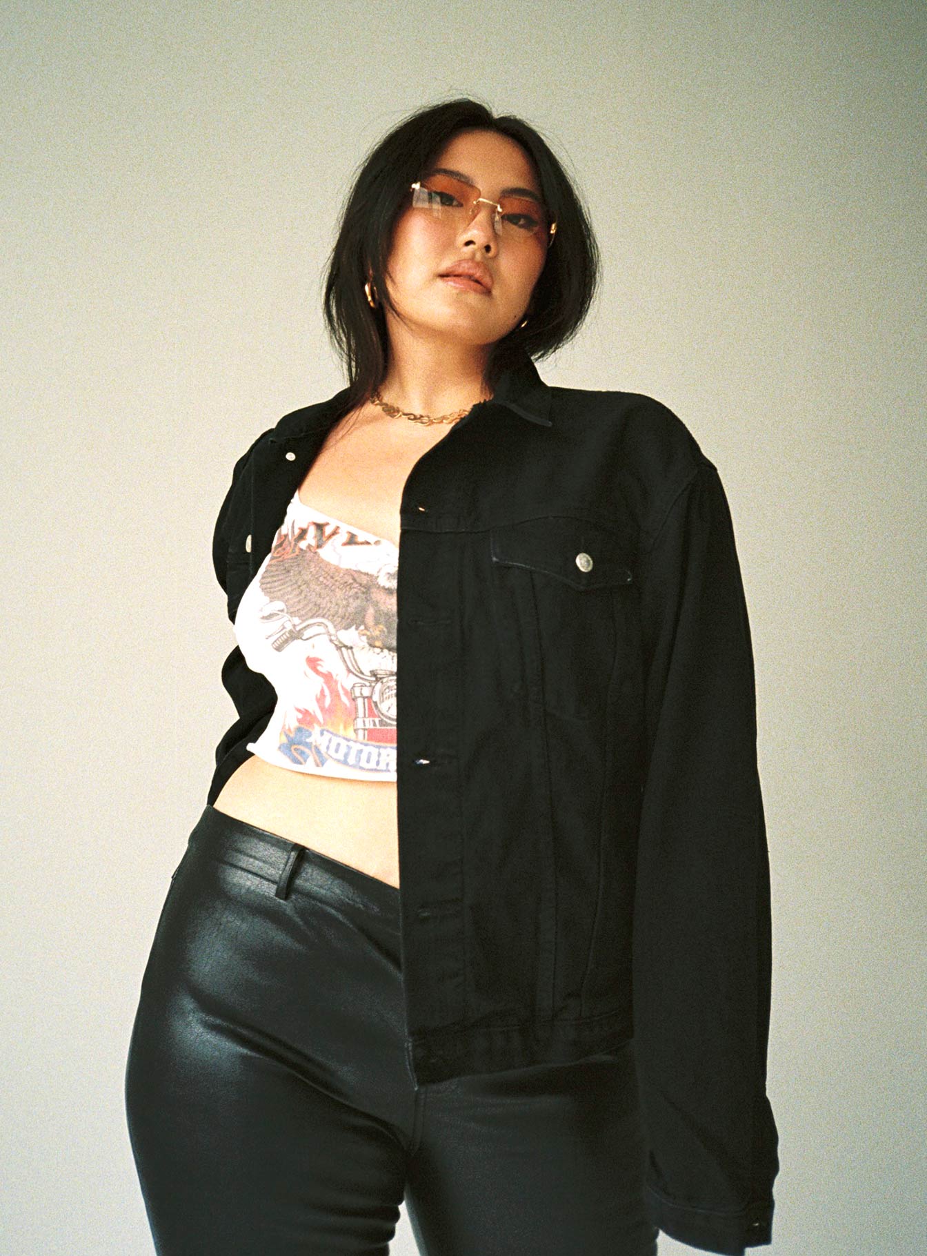 Oversized black denim jacket Button front fastening Four pocket design  Single-button cuff Silver buttons