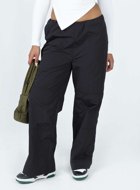 Parachute pants Windbreaker material Elasticated waistband Wide leg