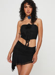 Matching two-piece set, mesh material Strapless crop top, ruched sides, ruffle & rose details Mid-rise asymmetric mini skirt, ruched waistband, ruffle detail Good stretch, fully lined