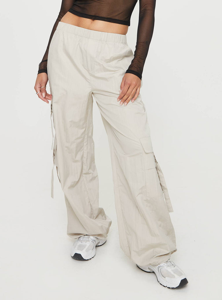 Cargo pants High-waisted, twin cargo style pockets on leg, faux pockets at the back, elasticated waist & hem cuff Non-stretch, unlined 