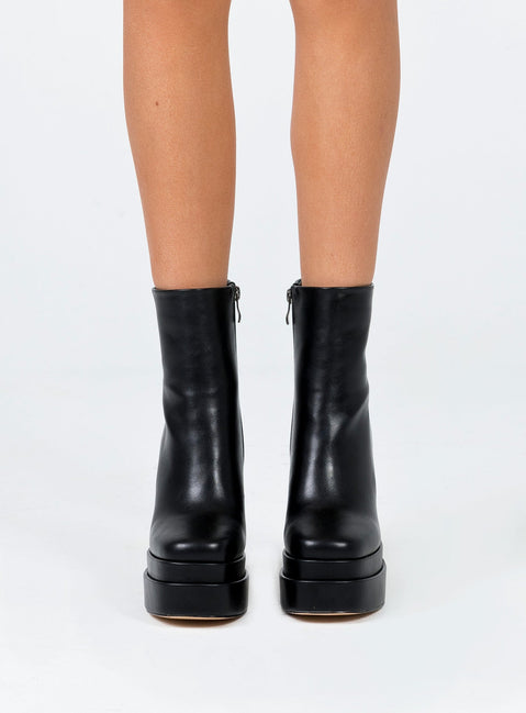 Black boots Faux leather material Zip fastening at side Square toe Platform base Block heel