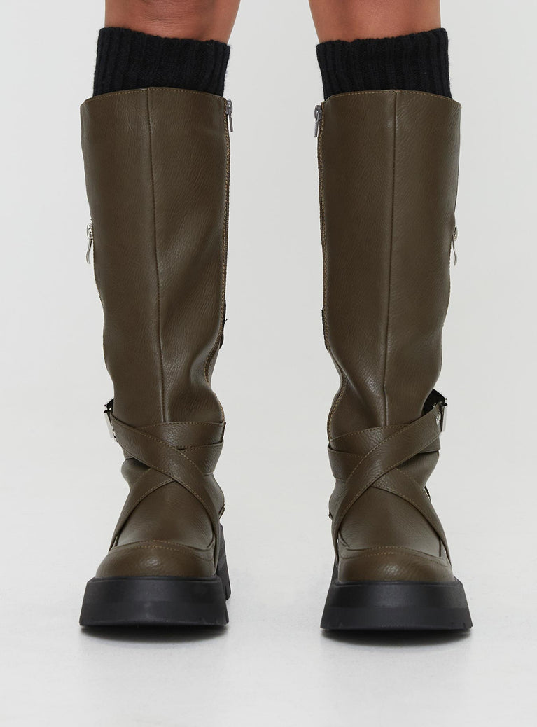 Knee-high faux leather boots Strappy upper, silver-toned buckles, round toe, treaded sole, contrast sole, zip fastening 