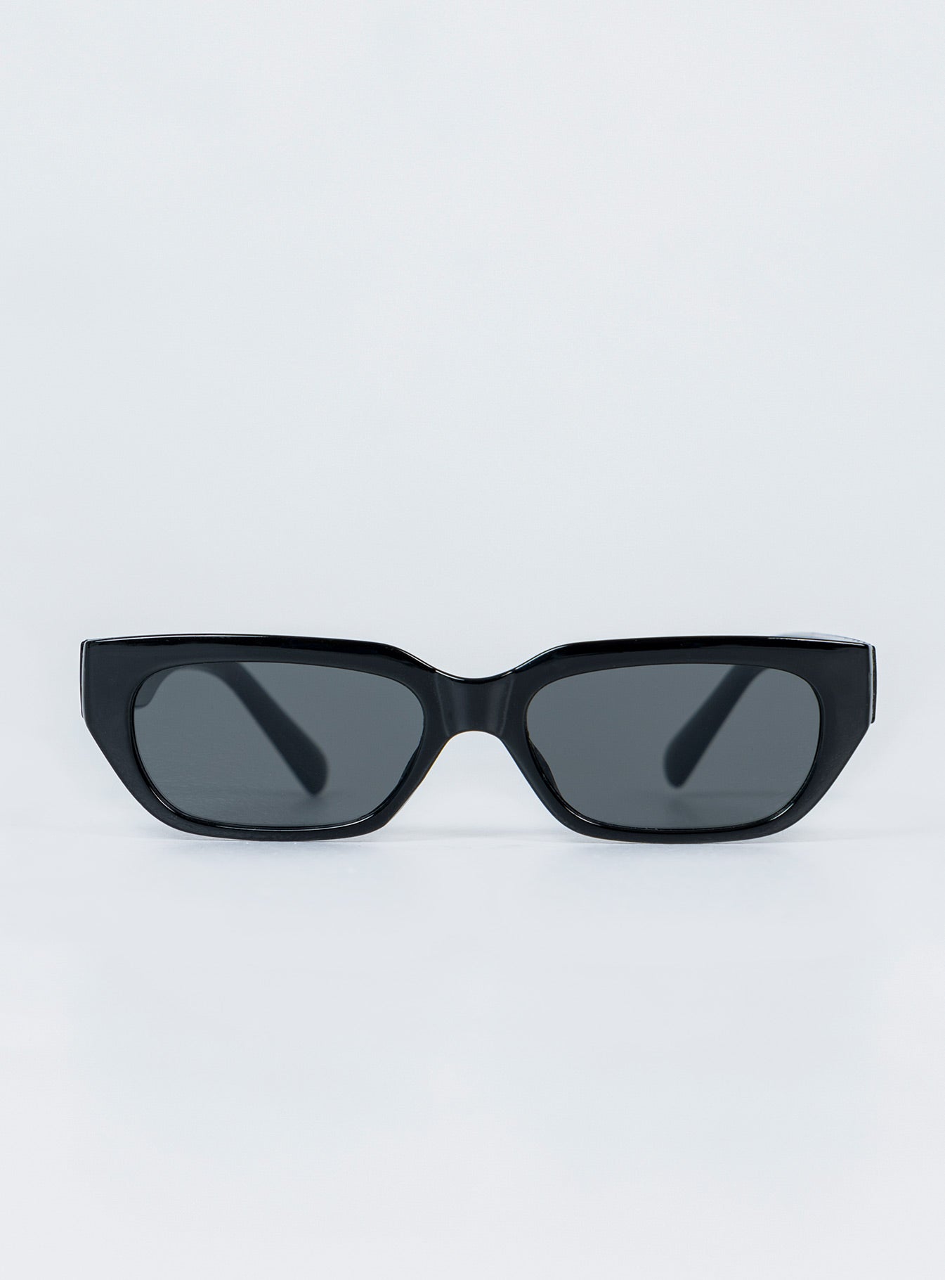 Sunglasses  100% plastic  UV 400 Slim style Transparent frame  Moulded nose bridge  Grey tinted lenses 