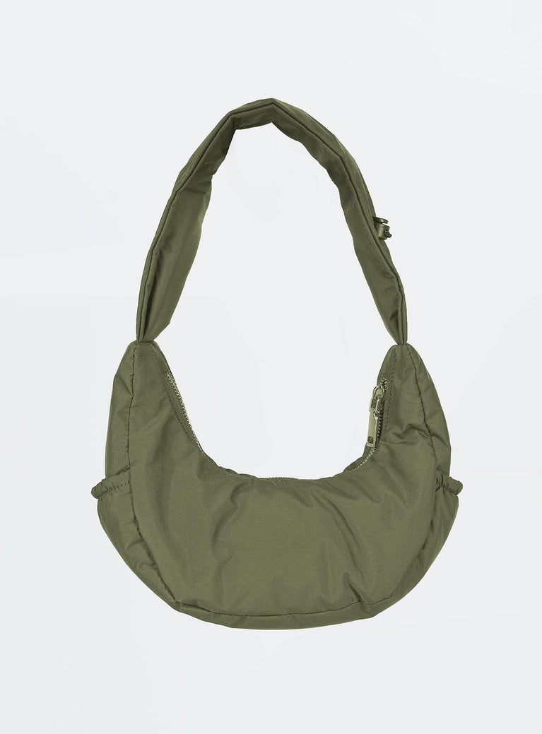 Shoulder bag Fixed adjustable strap Zip fastening  Two slip pockets at side Internal pockets Flat base