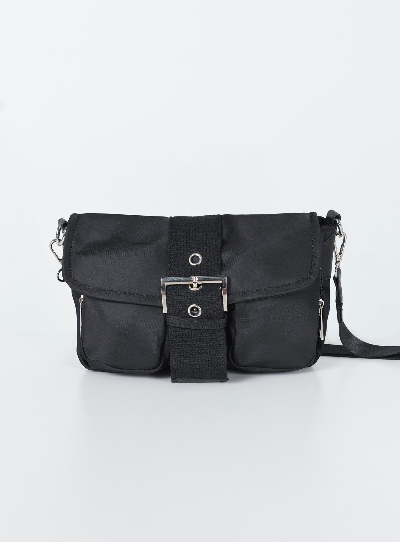 Crossbody bag  Princess Polly Exclusive Nylon material  Silver-toned hardware  Removable & Adjustable strap Magnetic button fastening  Zip closure Two external pockets  Fully lined  Flat base 