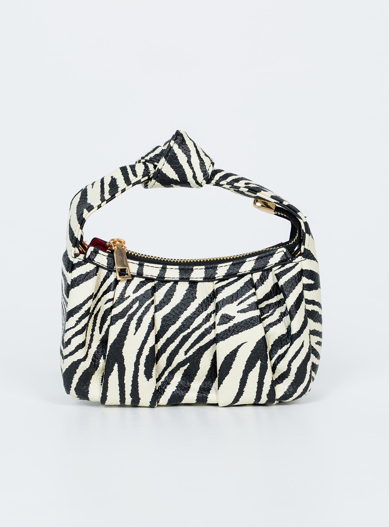 Bag Zebra print Single handle Removable chain shoulder strap Removable leather crossbody strap Pleated deatil Zip fastening One main compartment