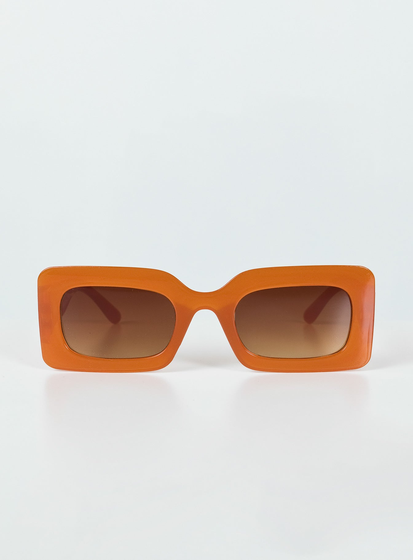 Sunglasses Vintage style frame Orange tinted lenses Wide arm Moulded nose bridge Lightweight