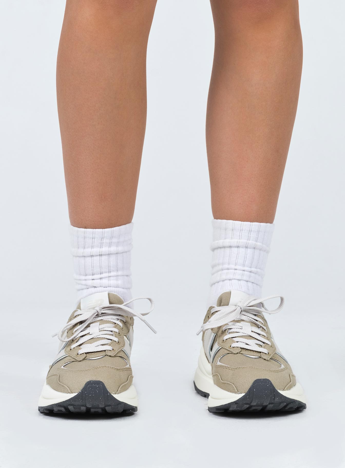 Sneakers  Lace-up style  Platform base Padded inner  Treaded sole 