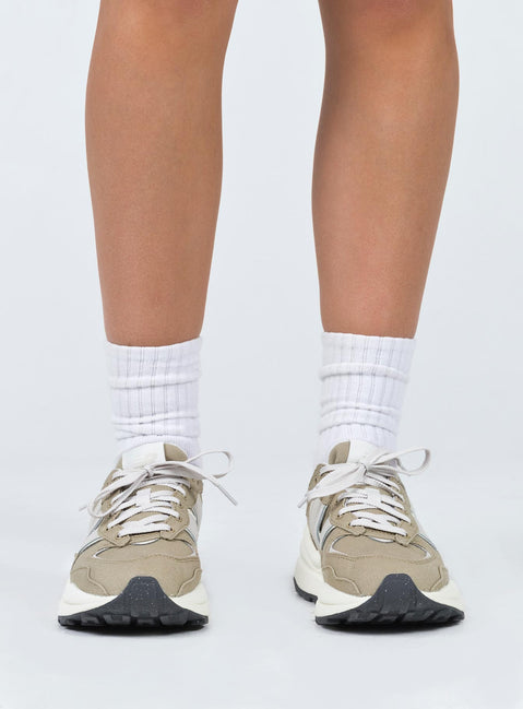 Sneakers  Lace-up style  Platform base Padded inner  Treaded sole 