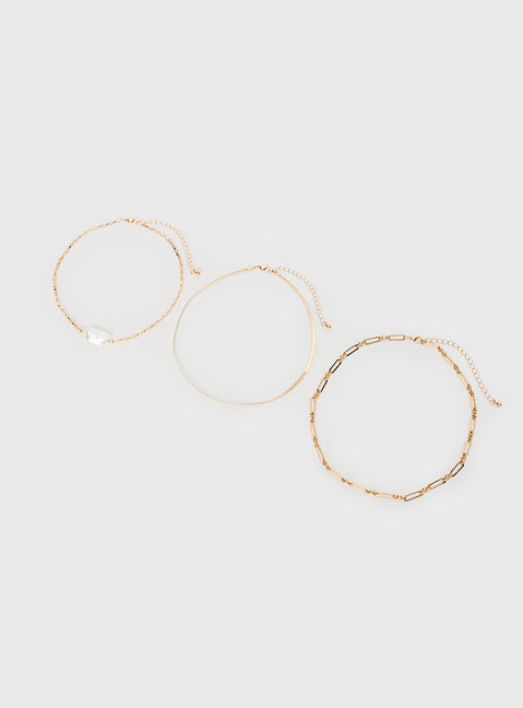 Gold-toned necklace Pack of three seperate chains, lobster clasp fastening, pearl detail