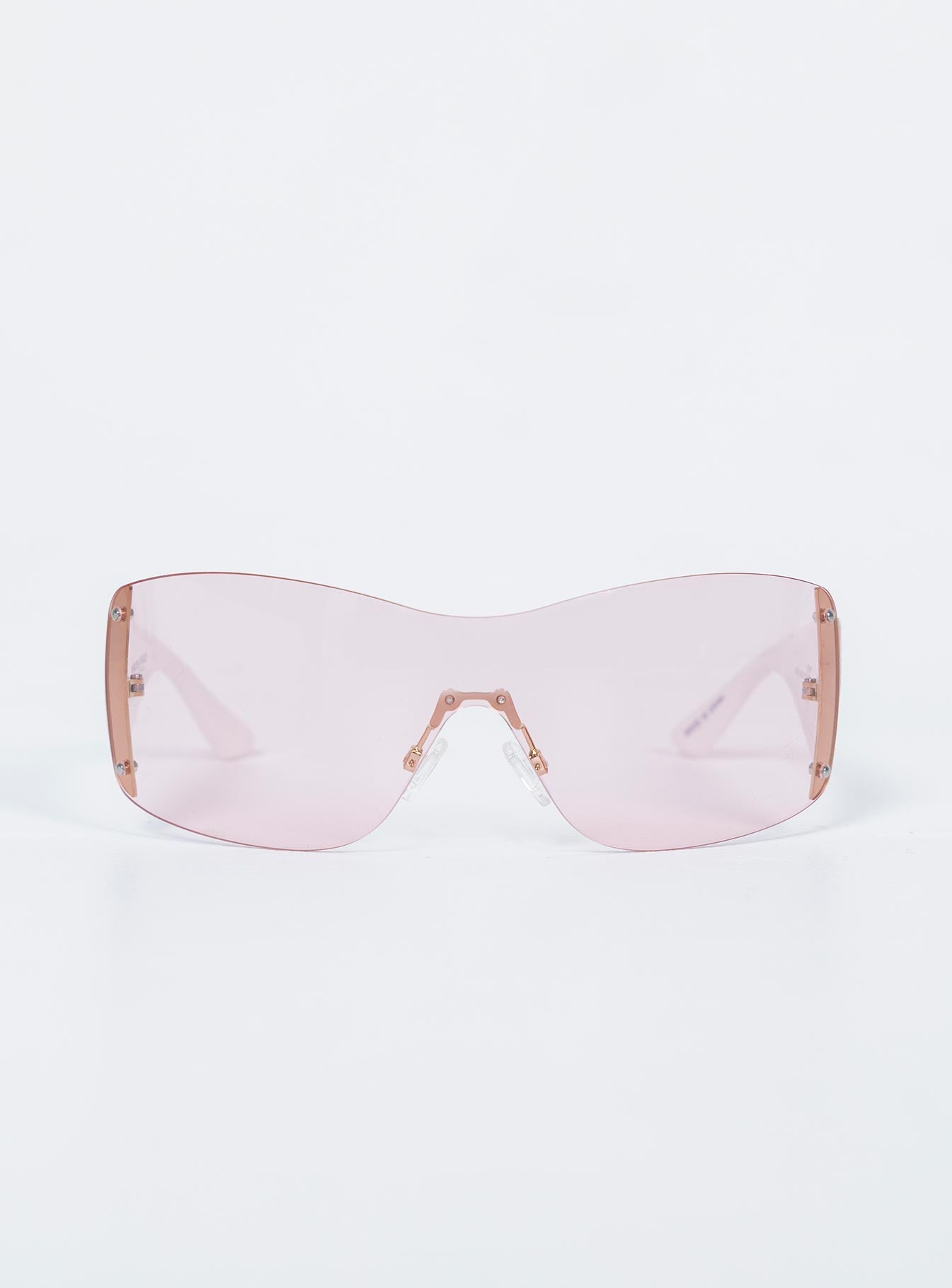 Sunglasses Frameless design  Pink tinted lenses Adjustable silicone nose pads 