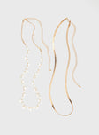 Gold-toned chain belt Two separate chains, pearl detail, lobster clasp fastening