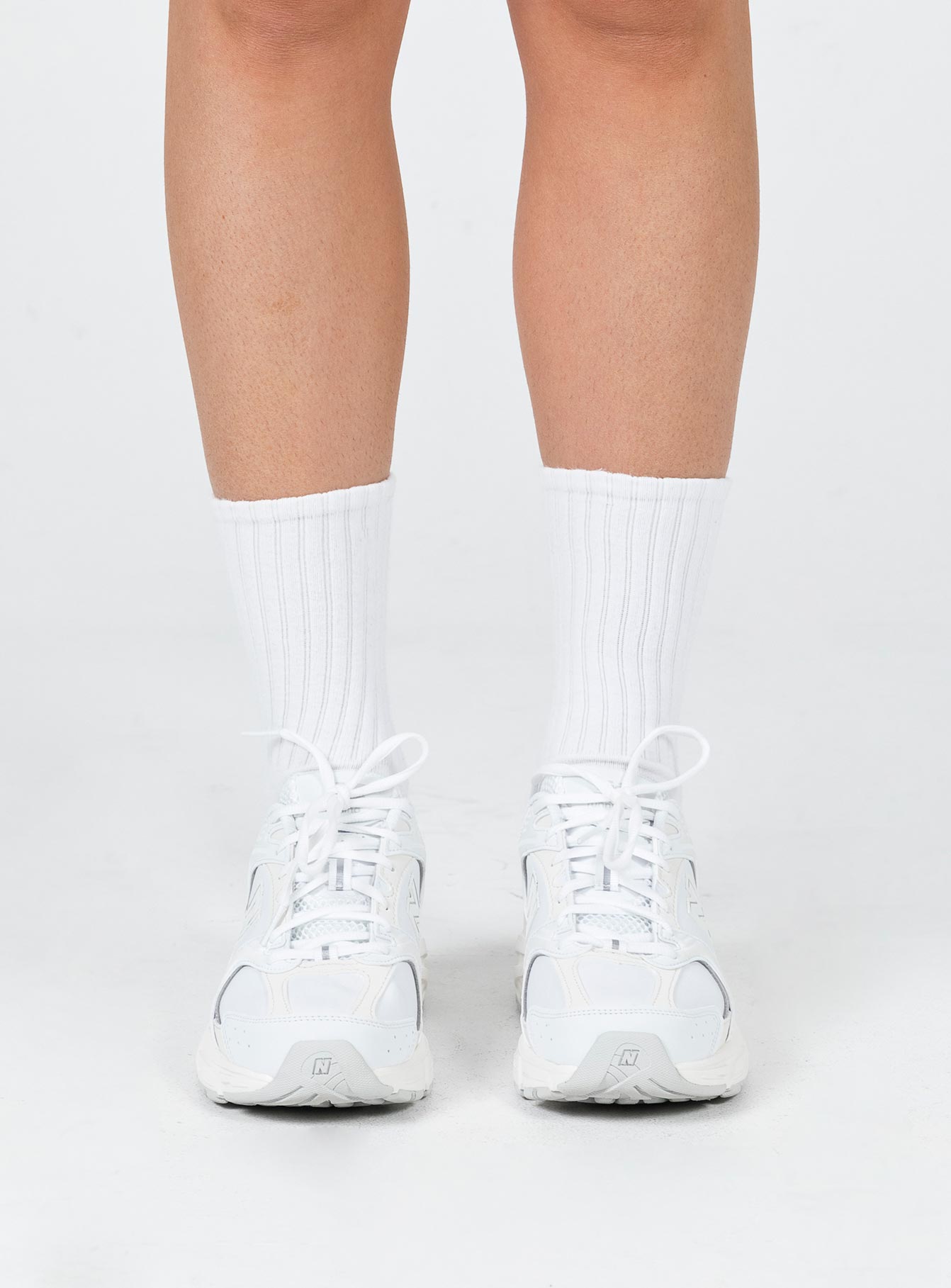 Sneakers Faux leather Lace-up fastening Pull tab at heel Treaded sole Padded footbed