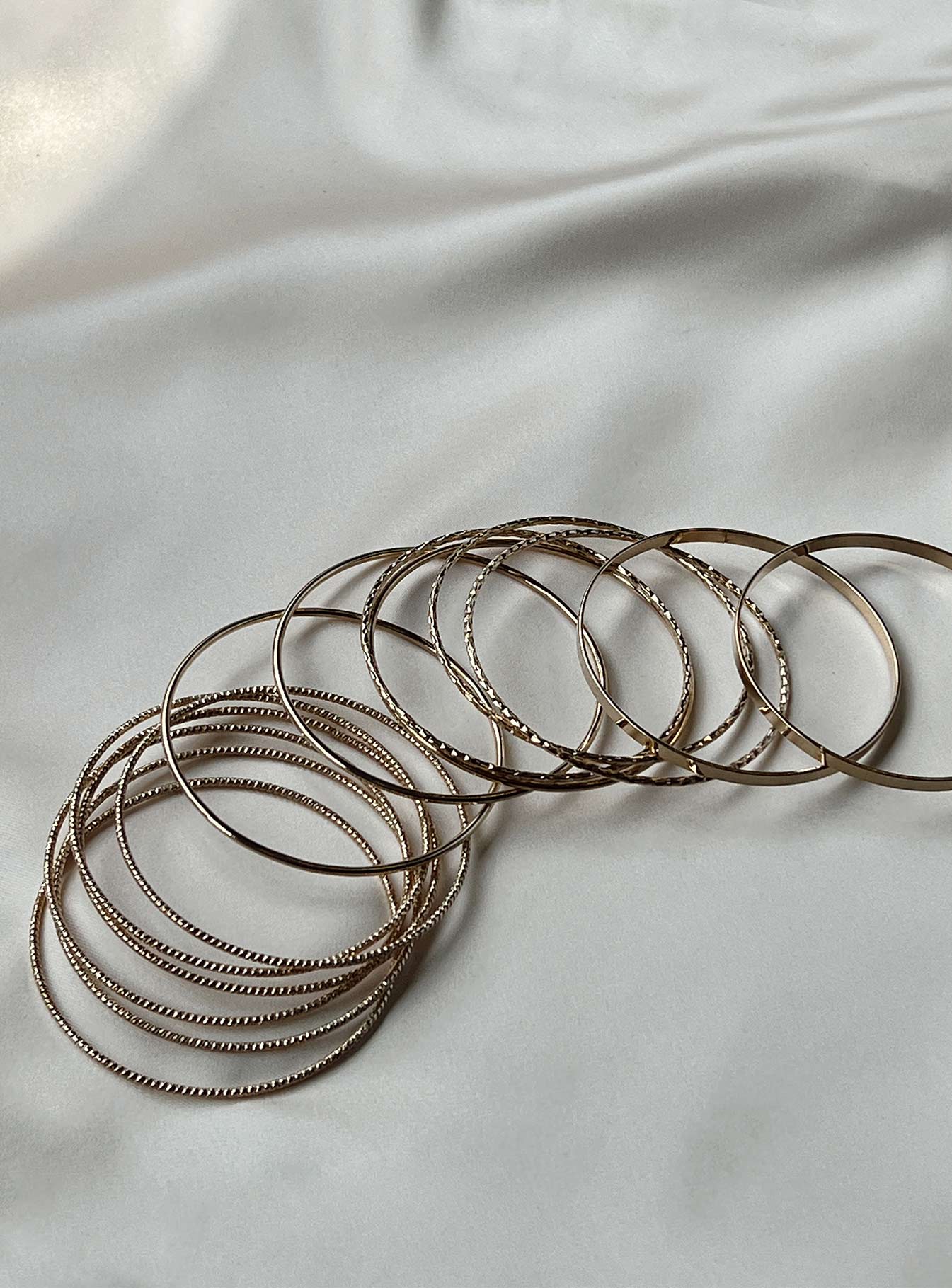 Bangles Gold-toned Pack of fourteen Individual styles - these can be worn separately  