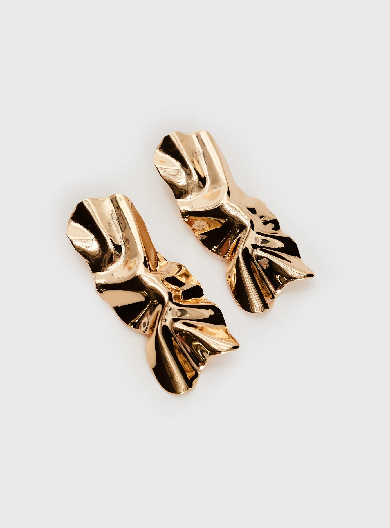 Gold toned statement earrings Stud fastening, heavyweight
