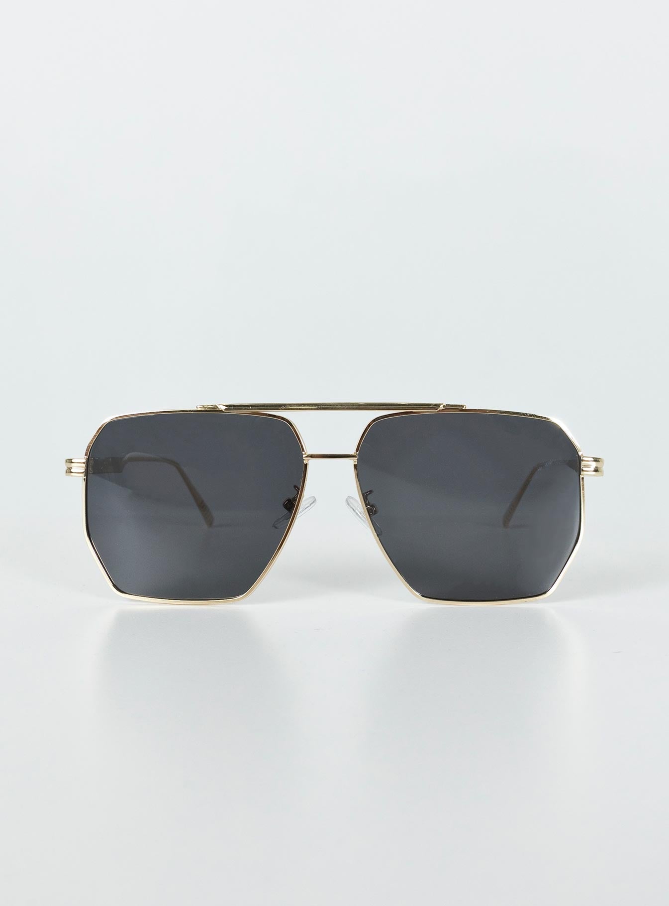 Sunglasses  UV 400 Metal arms Oversized style Smoke tinted lenses  Adjustable silicone nose pads 