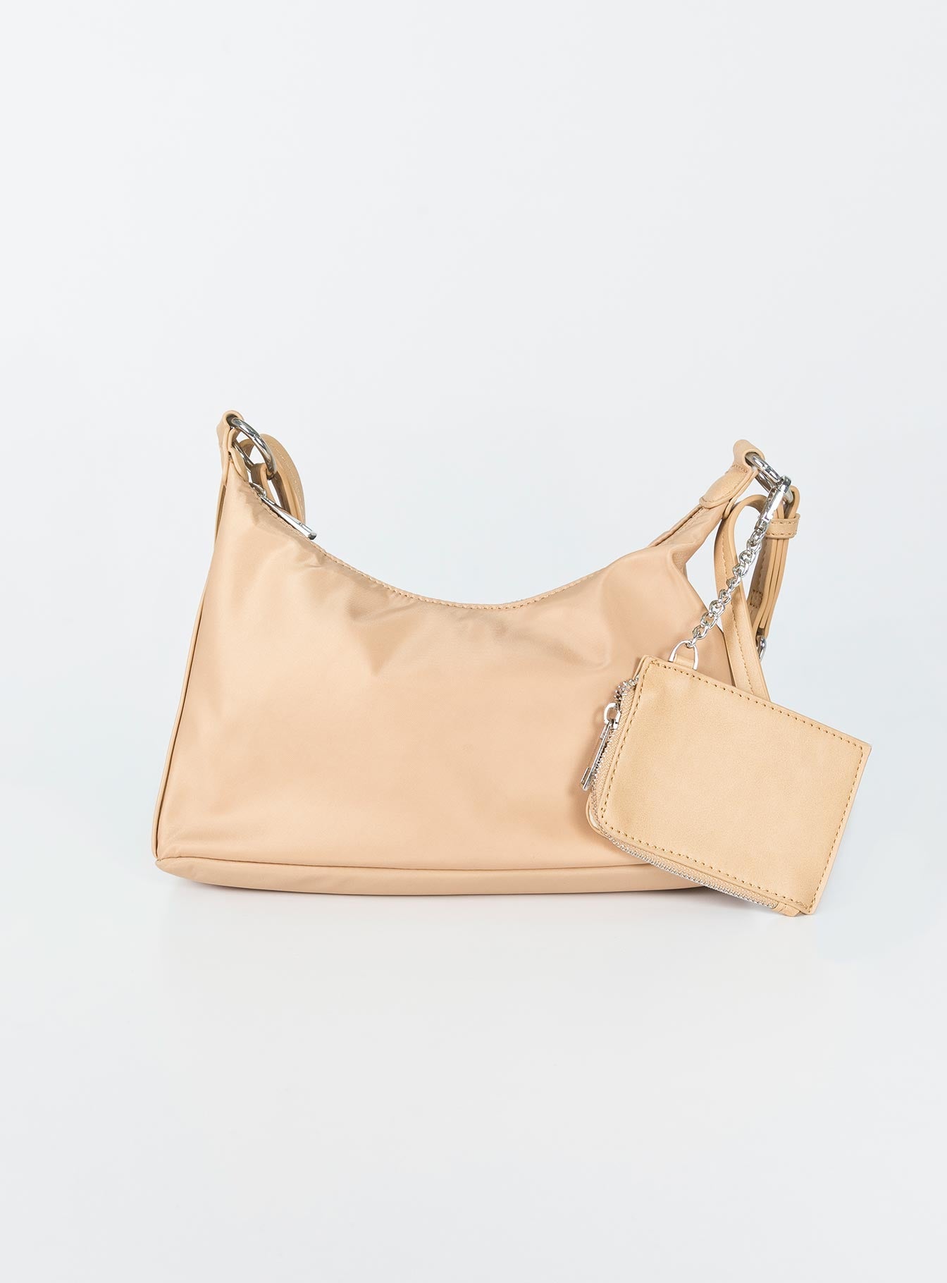 Crossbody bag  Princess Polly Exclusive Nylon & faux leather material  Silver-toned hardware  Chain shoulder strap  Removable & adjustable crossbody strap  Removable coin purse  Zip fastening Flat base 