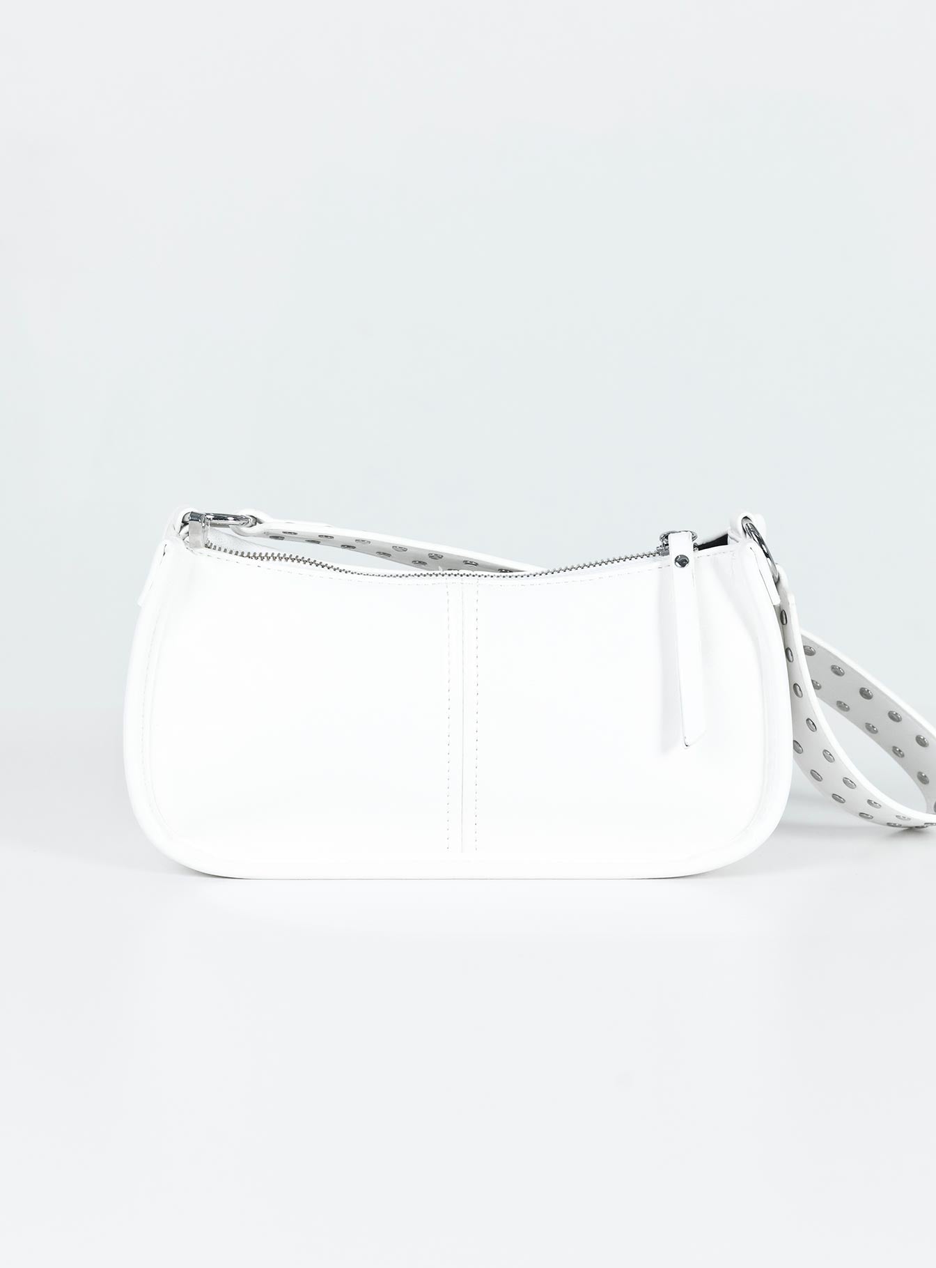 Bag Faux leather material Zip fastening Adjustable & removable cross-body strap Removable fixed shoulder strap Internal pocket Silver-toned hardware Flat base