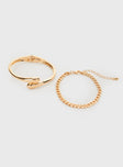 Gold-toned bracelet pack Two-piece set, chain bracelet with lobster clasp fastening, hinge fastening cuff