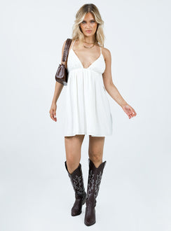 Mini dress Crinkle material Adjustable shoulder straps with tie fastening Plunging neckline Elasticated band at waist Low back