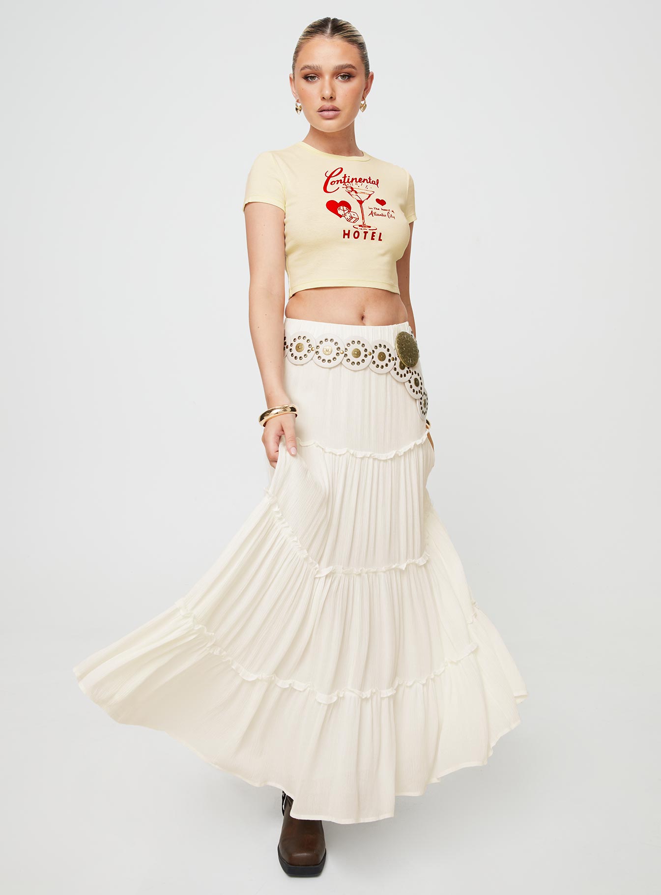    Graphic print baby tee, cap sleeves Slight stretch, unlined 