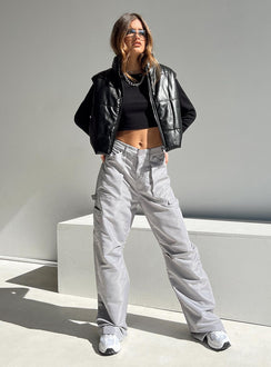 Puffer vest Main: 65% PU 35% polyester Lining: 100% polyester Faux leather material High neck Zip front fastening Elasticated waist Non stretch Fully lined