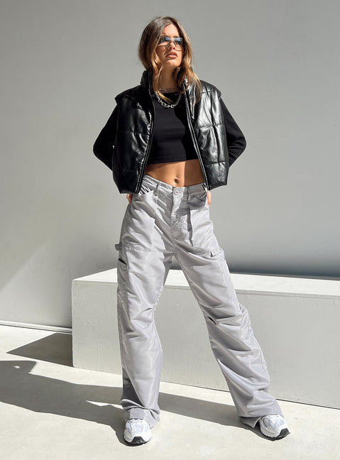 Puffer vest Main: 65% PU 35% polyester Lining: 100% polyester Faux leather material High neck Zip front fastening Elasticated waist Non stretch Fully lined