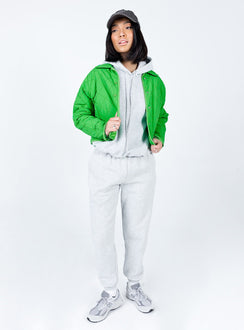 Cropped jacket  100% nylon  Quilted material Classic collar Press button front fastening  Twin hip pockets  Fully lined 